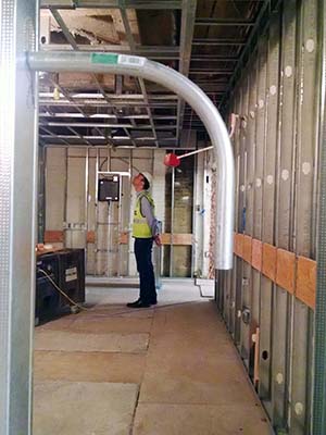 Lab director Peter Leonard standing in the future meeting room